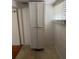 Hallway storage with white cabinet at 5418 Brownell St, Orlando, FL 32810