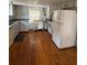 Clean kitchen with classic design and hardwood floors at 5418 Brownell St, Orlando, FL 32810
