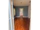 Inviting living room with wood floors and natural light at 5418 Brownell St, Orlando, FL 32810