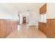 Open living space featuring wood floors and natural light at 201 W New York Ave, Orange City, FL 32763