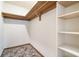 Empty walk-in closet with shelving, offering lots of storage space at 201 W New York Ave, Orange City, FL 32763