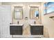 Bathroom with double vanity and updated lighting at 223 Pinehurst Dr, Auburndale, FL 33823