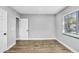 Bedroom with natural light and hard surface floors at 223 Pinehurst Dr, Auburndale, FL 33823