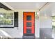 Eye-catching front door with a modern design and a welcoming entrance and house number sign at 223 Pinehurst Dr, Auburndale, FL 33823