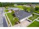 Aerial view of home showcasing well-manicured landscaping and a spacious driveway at 2973 Blackwater Creek Dr, Lakeland, FL 33810