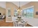 Cozy dining area with pool view, perfect for intimate meals and relaxation at 2973 Blackwater Creek Dr, Lakeland, FL 33810