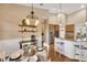 Cozy dining area featuring elegant decor, open shelving, and a breakfast bar for casual dining at 2973 Blackwater Creek Dr, Lakeland, FL 33810