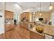 Spacious kitchen with granite counters, wood cabinetry, and an open layout perfect for entertaining at 2973 Blackwater Creek Dr, Lakeland, FL 33810