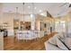 Open-concept kitchen featuring a breakfast bar with stylish pendant lighting at 2973 Blackwater Creek Dr, Lakeland, FL 33810