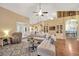 Spacious living room with high ceilings, hardwood floors, and abundant natural light at 2973 Blackwater Creek Dr, Lakeland, FL 33810