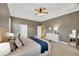 Comfortable main bedroom with a serene ambiance, featuring ample natural light and stylish furnishings at 2973 Blackwater Creek Dr, Lakeland, FL 33810