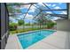 Beautiful pool and patio area are surrounded by a screen enclosure at 2973 Blackwater Creek Dr, Lakeland, FL 33810