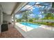 Covered pool area provides shade for relaxing with plenty of room for entertaining at 2973 Blackwater Creek Dr, Lakeland, FL 33810