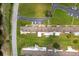 Drone's eye view highlights layout and location of condo in community at 4209 Club Cir, Lakeshore, FL 33854