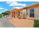 Exterior of property with hardscaped patio and outdoor seating at 4209 Club Cir, Lakeshore, FL 33854