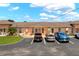 Charming condo building with well-maintained landscaping and convenient parking spaces for residents and guests at 4209 Club Cir, Lakeshore, FL 33854