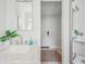 Bright bathroom with a marble countertop and plant at 739 Park Hill Ave, Lakeland, FL 33801