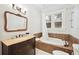 Bathroom featuring a soaking tub and modern fixtures at 739 Park Hill Ave, Lakeland, FL 33801