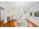 Elegant dining room with a chandelier, hardwood floors, and ample natural light at 739 Park Hill Ave, Lakeland, FL 33801