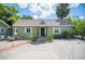 Charming home with a well-maintained yard and inviting front entrance, showcasing curb appeal at 739 Park Hill Ave, Lakeland, FL 33801