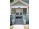 Charming front porch featuring an inviting seating area and a well-maintained entrance at 739 Park Hill Ave, Lakeland, FL 33801