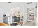 Kitchenette view with appliances, foldable table and plenty of natural light at 739 Park Hill Ave, Lakeland, FL 33801