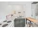 Kitchenette featuring modern countertops, drop-leaf table, and stainless steel faucet at 739 Park Hill Ave, Lakeland, FL 33801