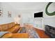 Comfortable living room with hardwood floors, opening into the dining room at 739 Park Hill Ave, Lakeland, FL 33801