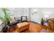 Cozy nook with chairs, ottoman, and bright natural light from the windows at 739 Park Hill Ave, Lakeland, FL 33801