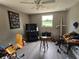 Bedroom featuring neutral walls, ceiling fan, and ample natural light from the window at 3220 Avenue J Nw, Winter Haven, FL 33881