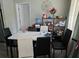 Casual dining area with a modern table set perfect for Gathering meals and gatherings at 3220 Avenue J Nw, Winter Haven, FL 33881