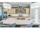 Spacious kitchen with a large island, stainless steel appliances, and modern lighting at 2401 Lafayette Ave, Winter Park, FL 32789