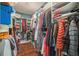 Organized walk-in closet with ample storage space for clothing and accessories at 2401 Lafayette Ave, Winter Park, FL 32789