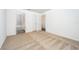 Neutral bedroom with soft carpeting near the ensuite bathroom at 3228 Seville St, Lake Alfred, FL 33850