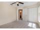 Bedroom with a closet and view into a bathroom at 3243 Winchester Estates Cir, Lakeland, FL 33810