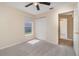 Bright bedroom with a window, closet and an ensuite bath at 3243 Winchester Estates Cir, Lakeland, FL 33810