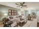 Spacious living room featuring contemporary furniture, elegant decor, and an open-concept design at 3747 King Hill Dr, Haines City, FL 33844