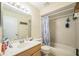 Standard bathroom featuring a shower-tub combo with updated vanity at 107 Talavera Ln, Kissimmee, FL 34758