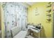 This office area features a desk, chair, and charming wallpaper at 107 Talavera Ln, Kissimmee, FL 34758