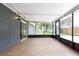 Covered and screened patio with tile flooring offering a relaxing outdoor living space at 248 Lake Thomas Dr, Winter Haven, FL 33880