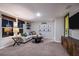 Cozy living room with comfortable seating, decor, and entertainment center at 4019 Gardenia Ave, Lake Hamilton, FL 33851
