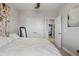 Inviting main bedroom featuring a comfortable bed, closet space, and neutral decor at 5489 Baldwin Park St, Orlando, FL 32814
