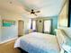 Large primary bedroom featuring natural light and stylish decor at 5489 Baldwin Park St, Orlando, FL 32814