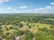 Aerial view capturing the vast landscape and neighborhood at 5525 Tillman Rd, Lakeland, FL 33810