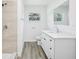 Bright bathroom with modern vanity, glass-enclosed shower, and pristine countertop for a spa-like experience at 5525 Tillman Rd, Lakeland, FL 33810