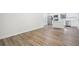 Open-concept living area, highlighting the modern kitchen with stainless steel appliances at 5525 Tillman Rd, Lakeland, FL 33810
