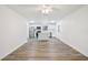 Well-lit kitchen with white cabinets, stainless steel appliances, and center island at 5525 Tillman Rd, Lakeland, FL 33810