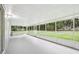 Covered screened porch overlooking the backyard at 5525 Tillman Rd, Lakeland, FL 33810