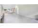 Spacious screened porch with a view of the yard and an exit door at 5525 Tillman Rd, Lakeland, FL 33810