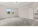 Spacious bedroom with natural light and a ceiling fan at 8875 Backspin Ln, Champions Gate, FL 33896